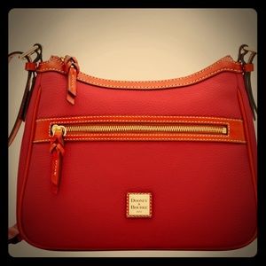 Maroon colored cross body Dooney & Bourke